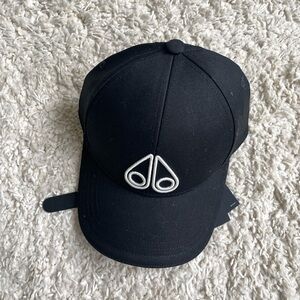 Moose Knuckles black cap new with tags never worn